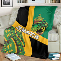 Jamaica lion Rastafarian blanket folded on sofa with bold JAMAICA text and stripes