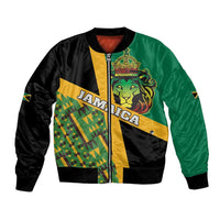 Green black bomber jacket with yellow Jamaica logo, lion graphic, and Kente-style panels