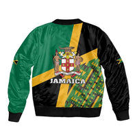 Green black bomber jacket with large Jamaica back graphic, crest, and Kente pattern