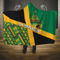 Green, yellow, and black hooded blanket with lion emblem, Jamaica text, and wide stripes