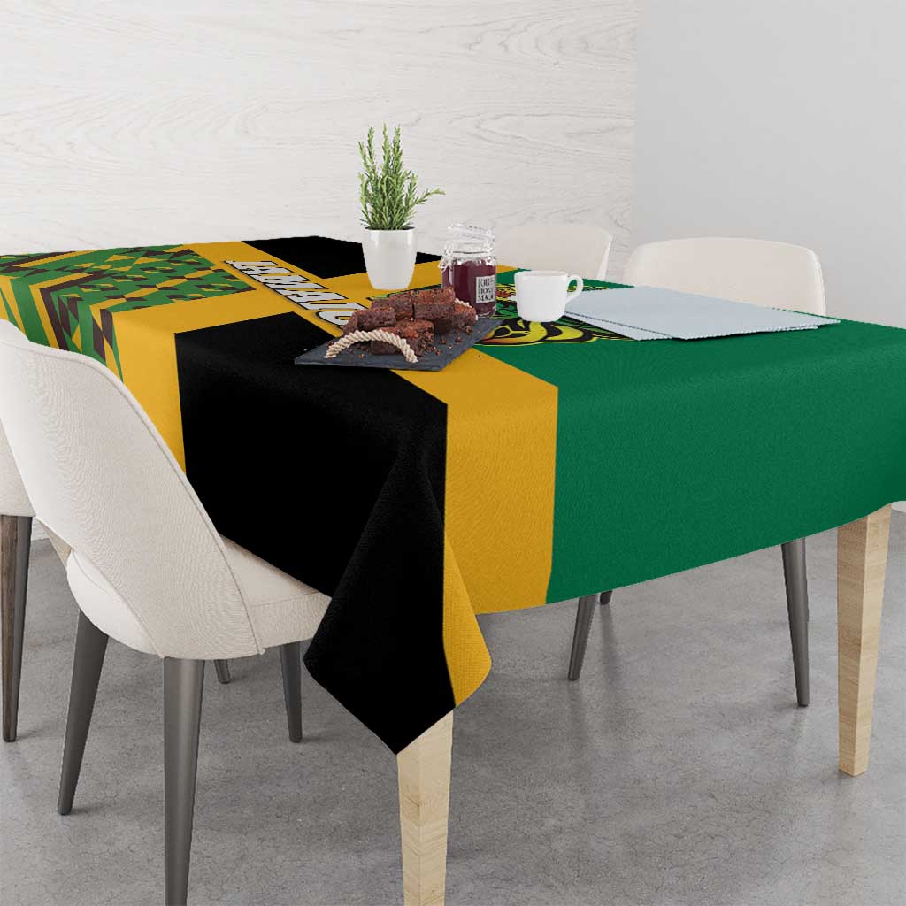 Green tablecloth with yellow border, black sections, and geometric lion patch design
