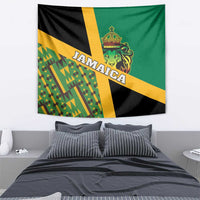 Jamaica lion tapestry behind bed, green/black/yellow kente pattern with Jamaica lettering