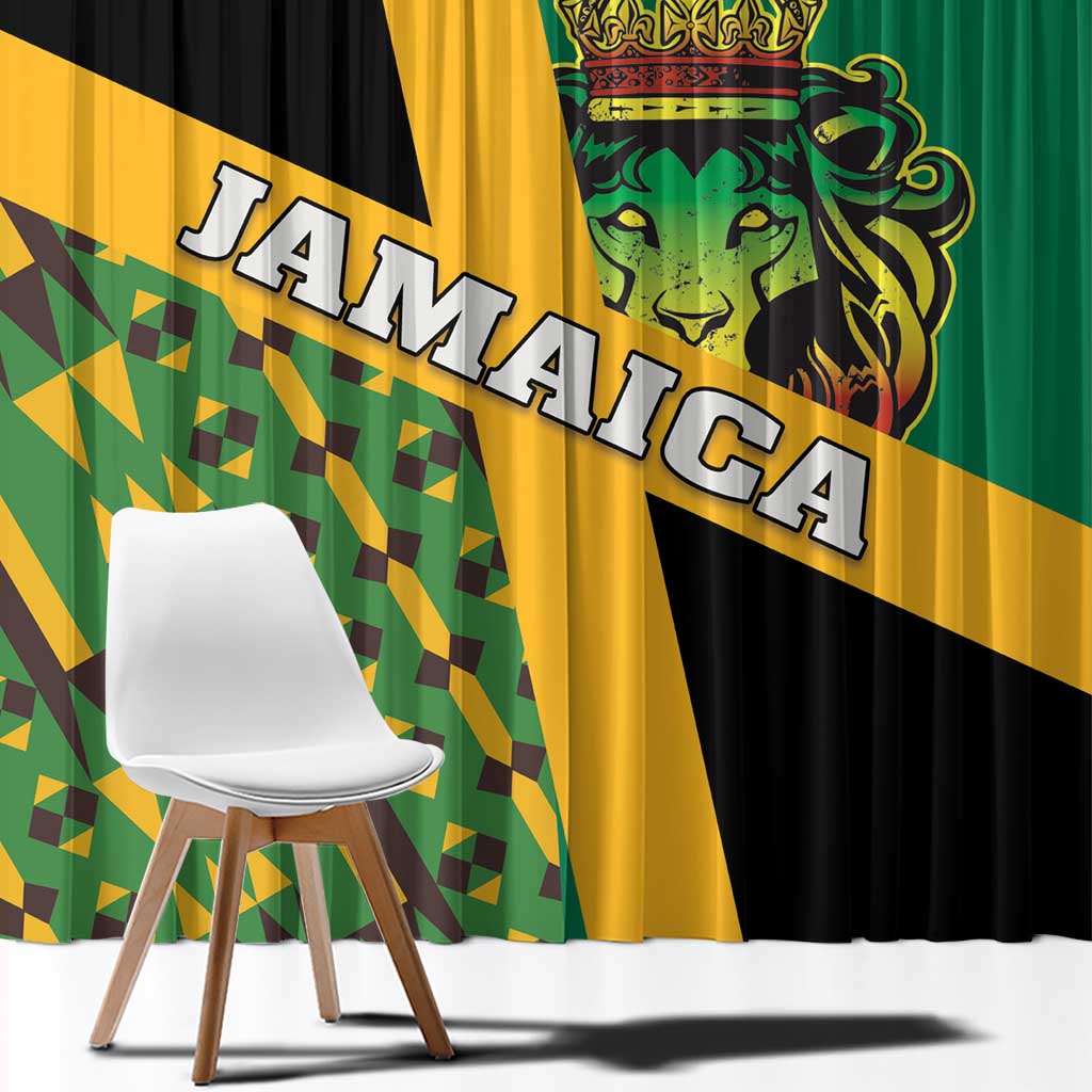 Close-up Jamaica window curtain with lion face crest and gold diagonal stripe on green/black.