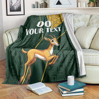 Green South Africa springbok blanket with yellow patterned border and custom text