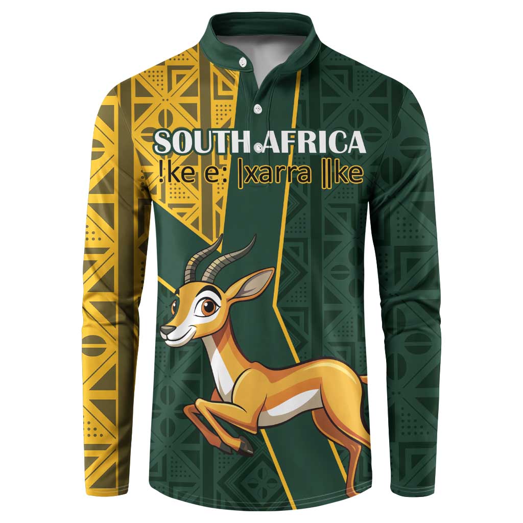 Dark green button sweatshirt with yellow Kente-style panels and front springbok graphic
