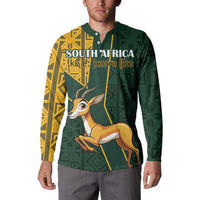 Green button sweatshirt on model with 'SOUTH AFRICA' text and springbok front graphic