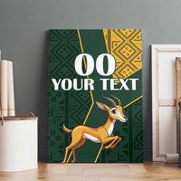 Canvas wall art featuring springbok on green patterned background with kente-style corners and “00 YOUR TEXT”