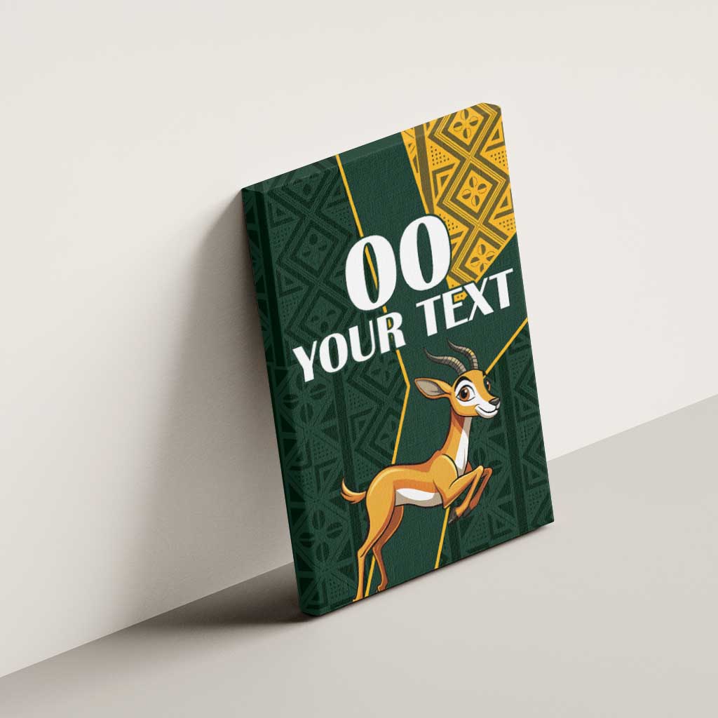 Canvas wall art mounted on wall with springbok, green geometric patterns, kente corner, “00 YOUR TEXT”