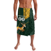 Green lavalava with gold kente panel, springbok graphic, and custom text area