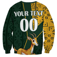 Unisex green and yellow graphic sweatshirt with antelope face and large centered text