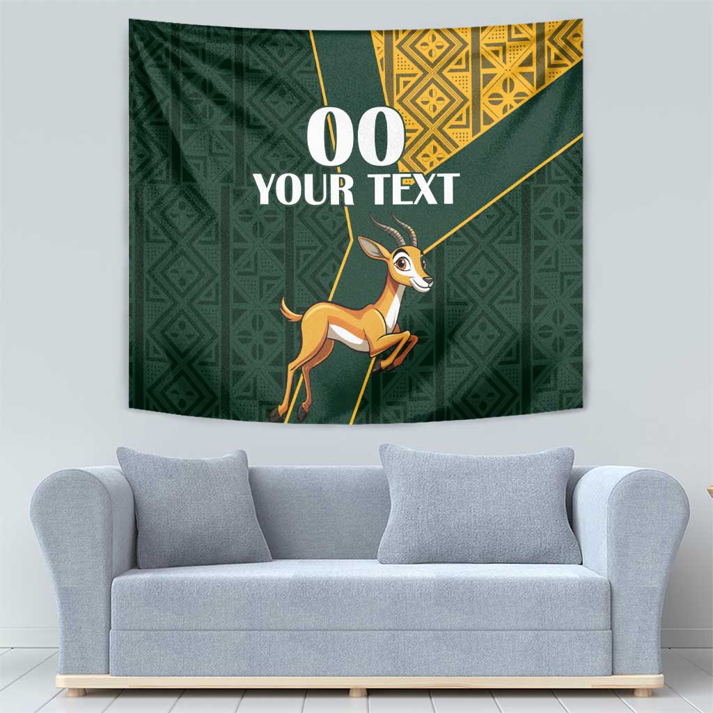 Green springbok tapestry with gold geometric kente patterns and custom text design