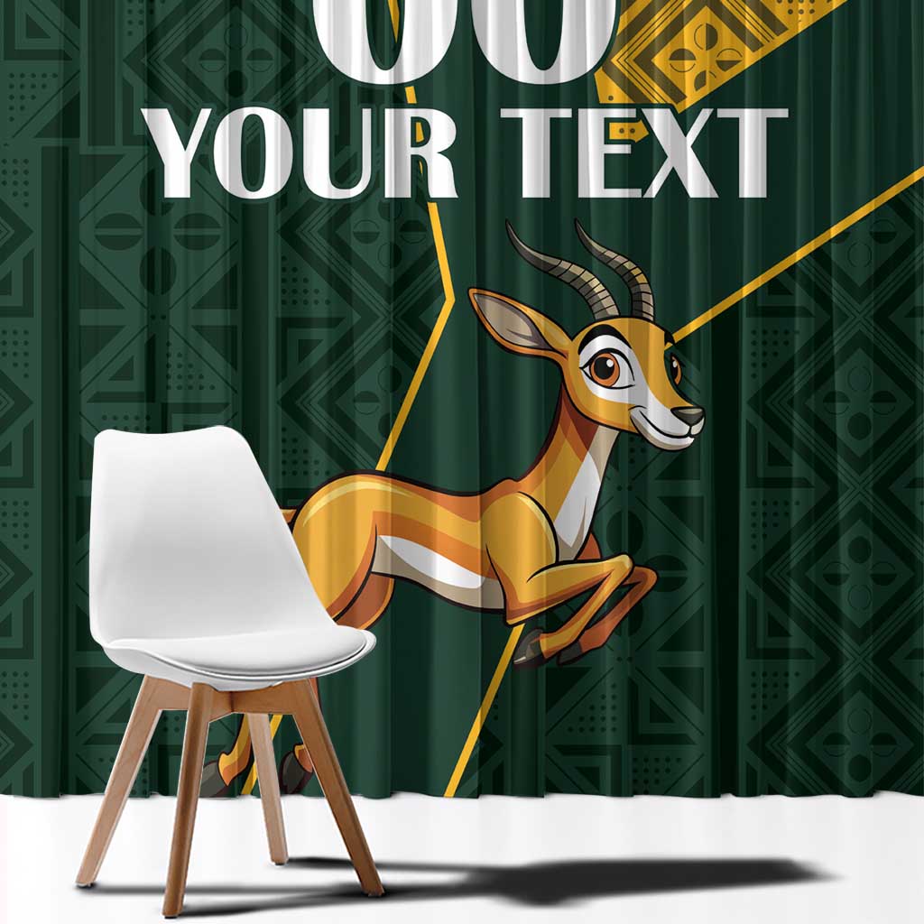 Green curtain close-up with springbok illustration, yellow geometric panel, and text