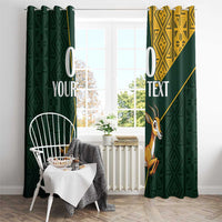 Green curtain pair with springbok print, yellow diamond panel, and white custom text