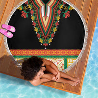 Round black beach blanket with V-shaped floral embroidery, multi-color border, and white fringe