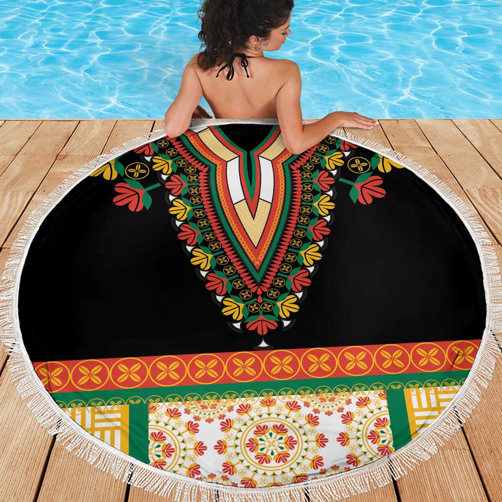 Round black beach blanket with V-shaped embroidered floral neckline pattern and white fringe