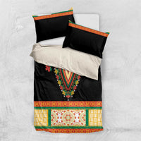 Black dashiki bedding set flat lay with multicolor V embroidery and patterned lower panel
