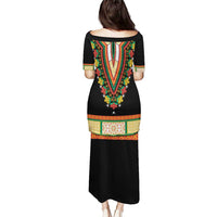 Black dashiki-style embroidered neckline floral dress, back view, short sleeves, long length