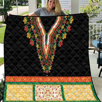 Black quilt with diamond texture, embroidered V-neck floral neckline, green-orange patterned hem