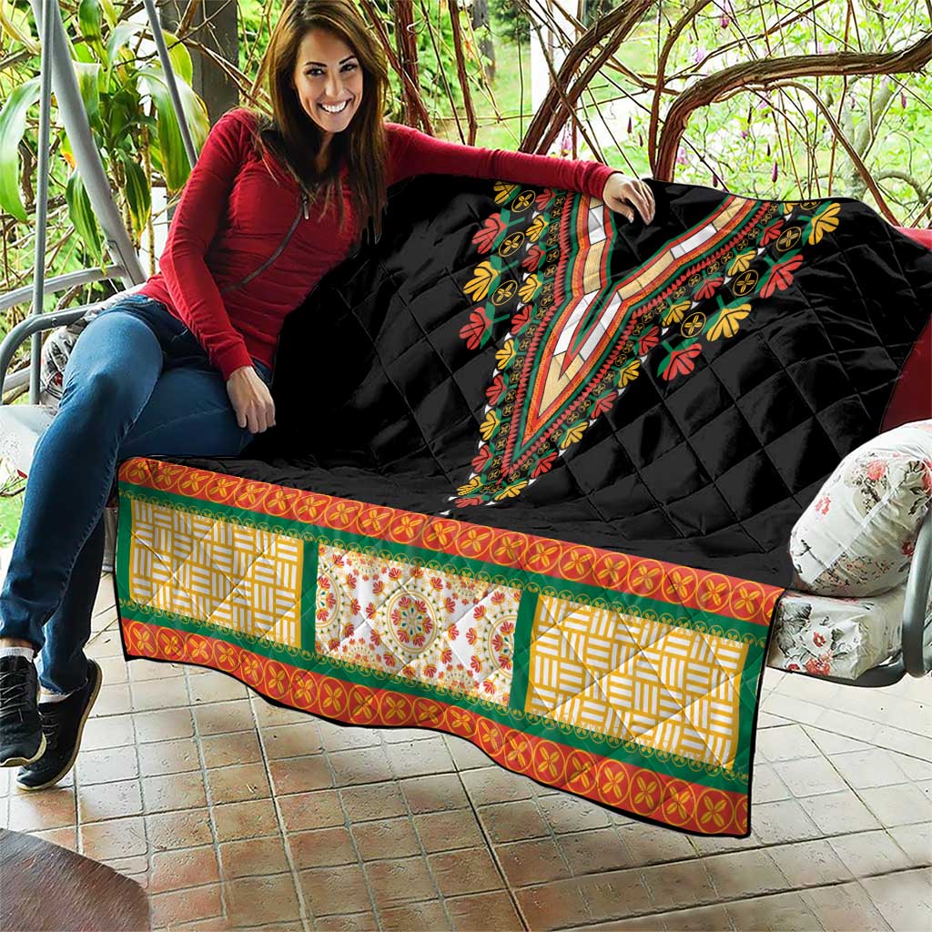 Black quilt blanket with diamond texture and embroidered V-neck floral motif, green-orange patterned hem