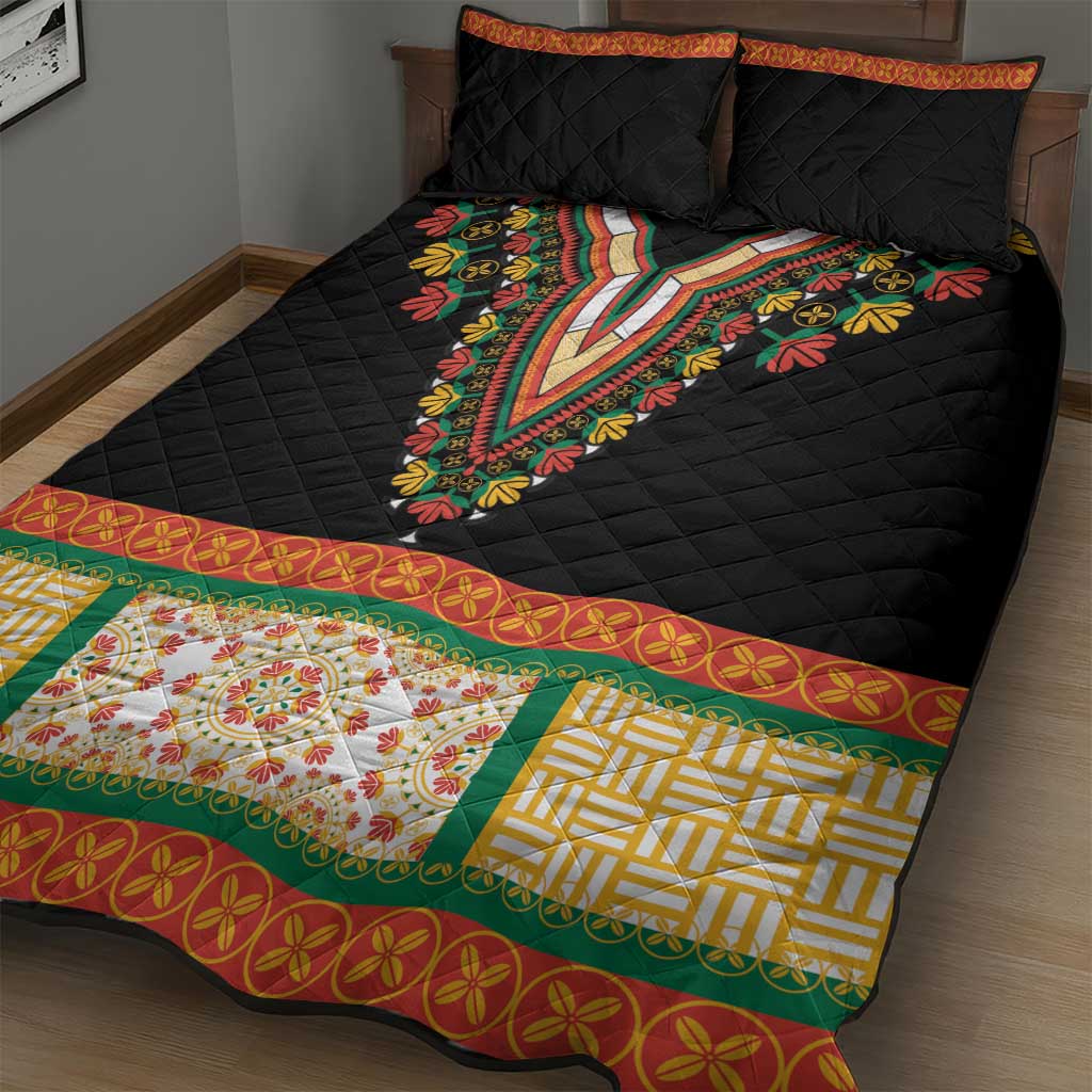 Black quilt bed set with colorful embroidered V-panel and floral trim, plus two pillows