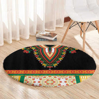 Black round embroidered rug with bright floral V center and ornate multicolor border