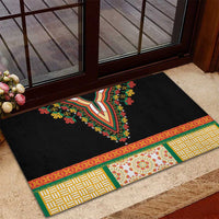 Black rubber doormat with bold V-shaped neckline embroidery and patterned green-red border