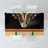 Black tablecloth with embroidered floral V-neck motif and colorful geometric border