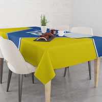 Blue and yellow tablecloth with overhanging corners on rectangular dining table