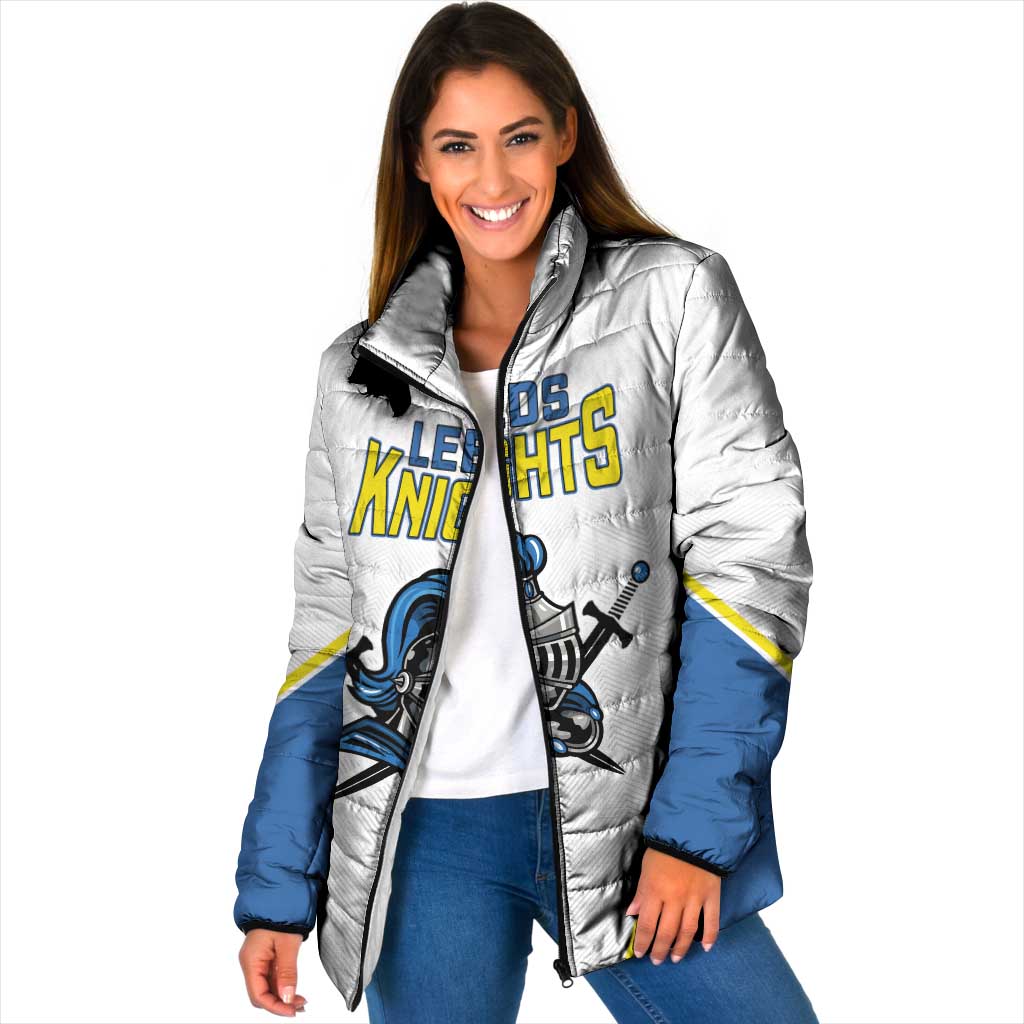 White padded jacket with full zip and stand collar, Leeds Knights front graphic, blue lower hem