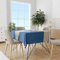 White and blue custom printed tablecloth on dining table with striped edges