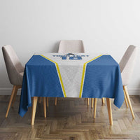 Blue and white printed tablecloth on dining table with bold '18' header