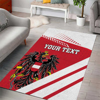 Red and white flag-style area rug with black crest graphic and “YOUR TEXT” banner.