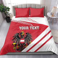 Red and white bedding set with 'YOUR TEXT', coat of arms emblem, and two red pillows