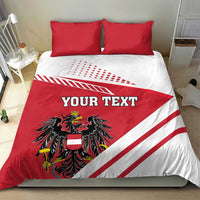 Red and white bedding set with 'YOUR TEXT' text, coat of arms crest, and red pillowcases