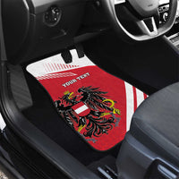 Red and white car floor mat with Austria coat of arms and 'YOUR TEXT' print.