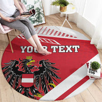 Red round rug with YOUR TEXT and black eagle coat of arms emblem