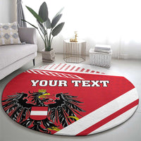 Red round carpet with YOUR TEXT and black eagle crest centered on rug