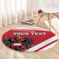 Red round rug with YOUR TEXT and black eagle coat of arms design