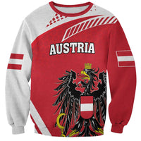 Red and gray crewneck sweatshirt with Austria crest and bold front text