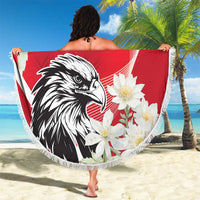 Round red beach blanket with 1955 Austria, black-and-white eagle, white blossoms, fringed edge