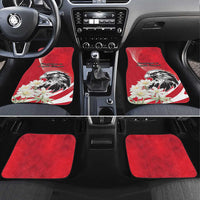 Red car floor mats with black eagle and white flower print, front pair