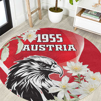 Round red Austria Independence Day 1955 rug with 1955 Austria text, eagle and flowers