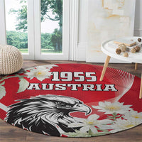Round red Austria Independence Day 1955 carpet with black eagle and floral graphic