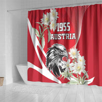 Red shower curtain with Austria eagle, 1955 text, and white blossoms over red stripes