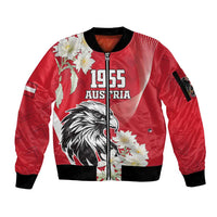 Red bomber jacket with front zip, 1955 Austria text, eagle and white flowers, sleeve patch.