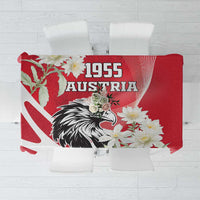 Red tablecloth with 1955 Austria eagle and floral motif, red and white design