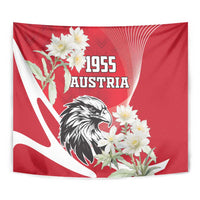 Close-up red Austria 1955 tapestry with eagle and white edelweiss blossoms