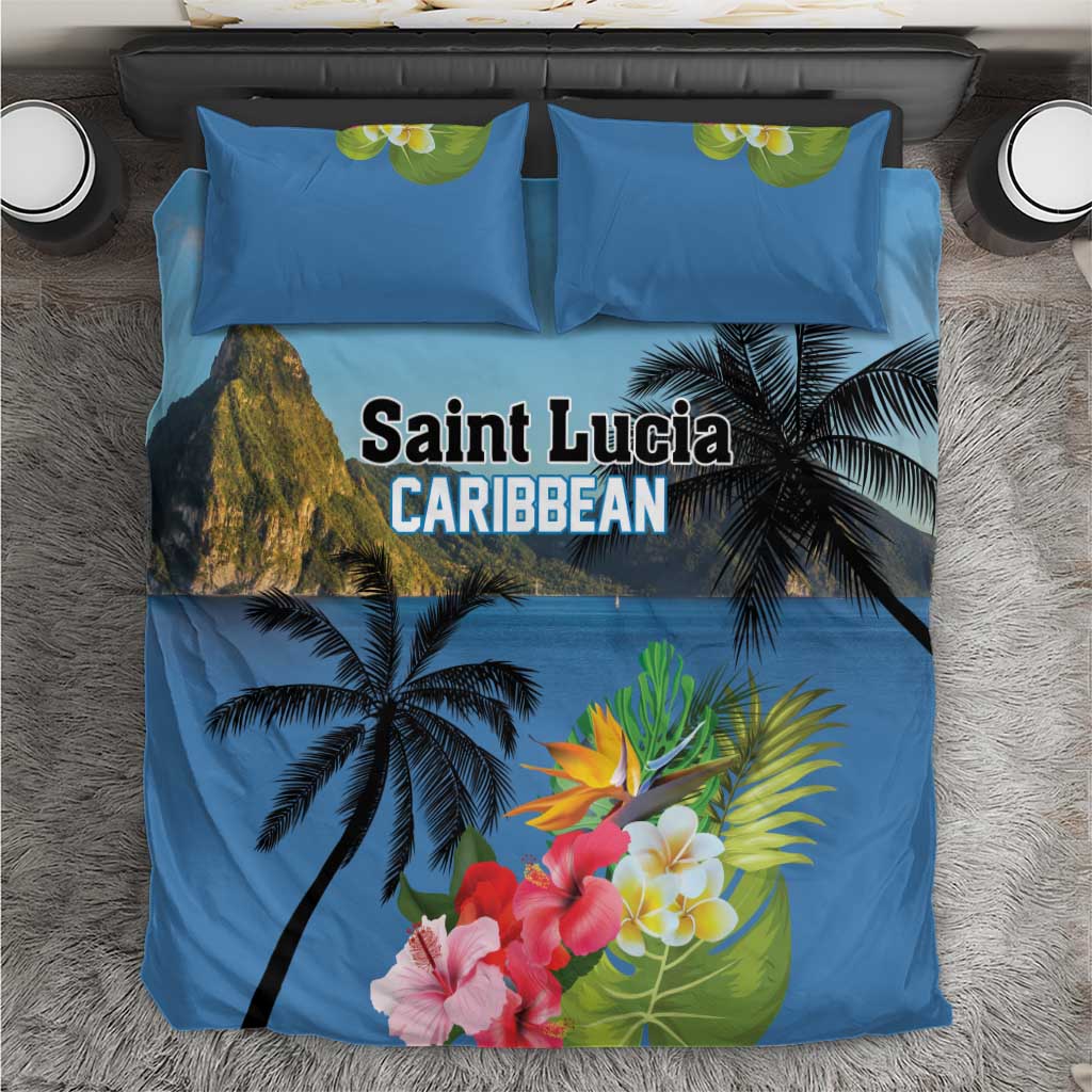 Blue duvet cover and pillow shams with palm trees, flowers, and 'Saint Lucia Caribbean'