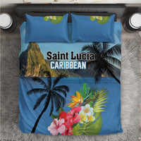 Blue duvet cover and pillow shams with palm trees, flowers, and 'Saint Lucia Caribbean'