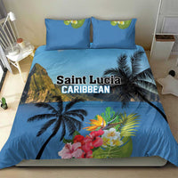 Blue duvet cover and pillow shams with tropical palm trees and hibiscus-style flowers